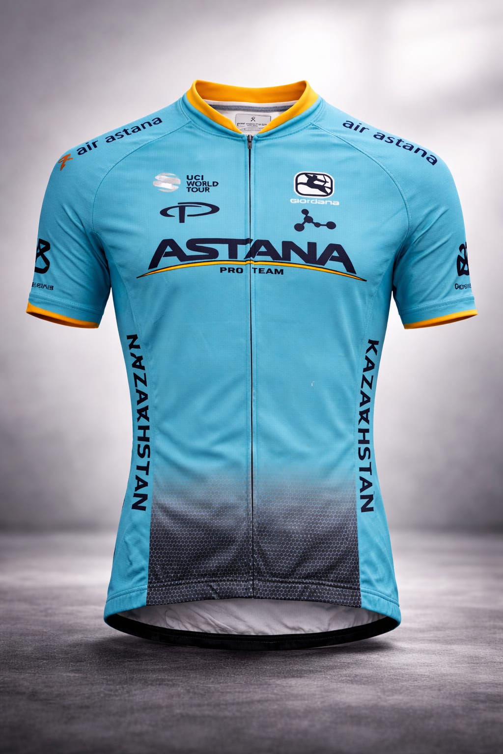 Front view of the light blue Astana Pro Team short sleeve cycling jersey featuring a full-length zipper, yellow collar, and sponsor logos including Giordana and Air Astana.