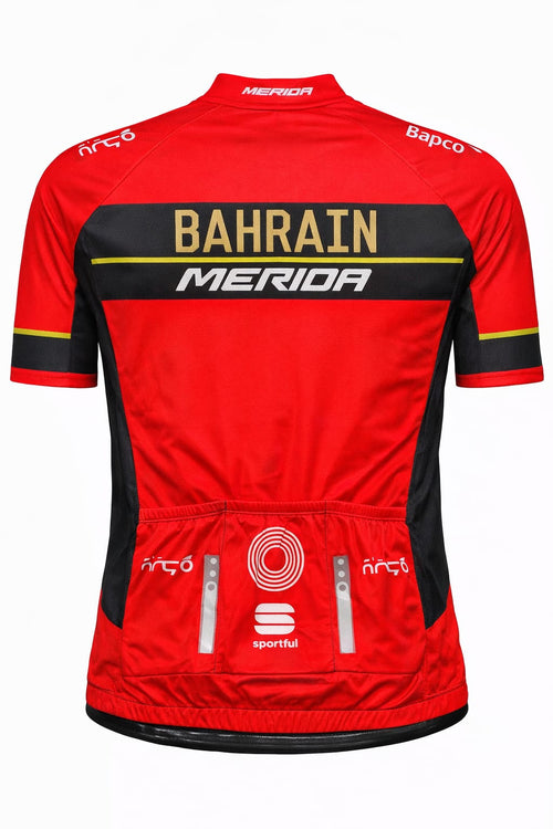 Back view of Bahrain Merida cycling jersey showing triple rear storage pockets with reflective elements and Sportful logo