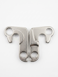 Dual silver metallic DH005 rear derailleur hangers arranged symmetrically in a heart shape on a clean white background.