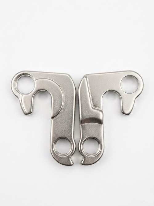 Dual silver metallic DH005 rear derailleur hangers arranged symmetrically in a heart shape on a clean white background.
