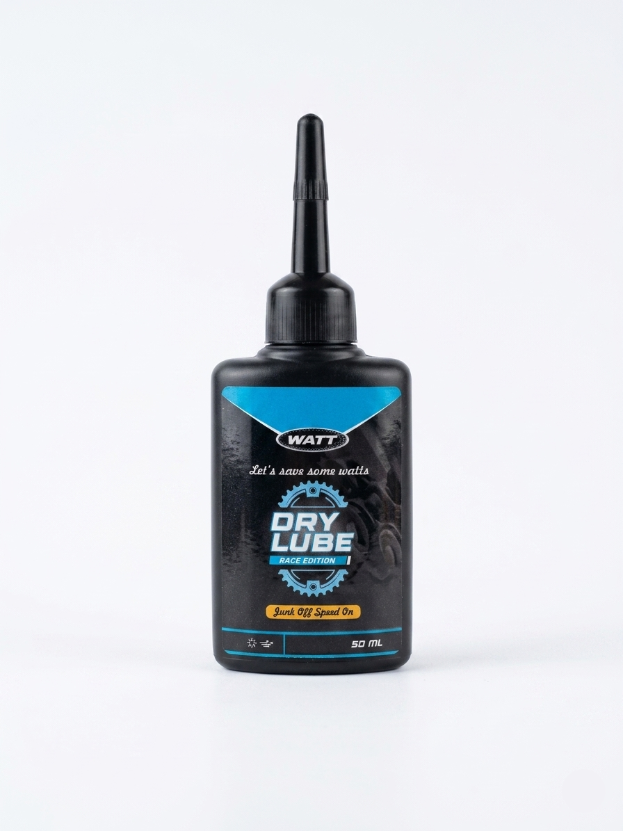 A 50ml black bottle of WATT Dry Lube Race Edition with a light blue and black label, featuring a gear icon, a precision applicator nozzle, and standing upright against a solid white background.