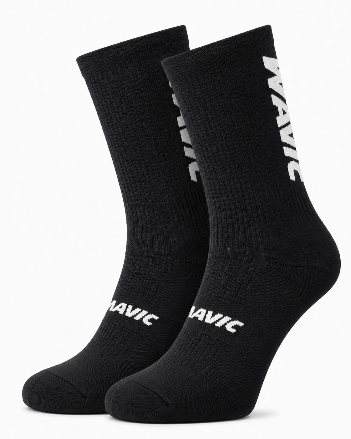 Pair of Mavic performance crew-height cycling socks in sleek stealth black, featuring bold white text branding stacked vertically along the side of the upper cuff and across the instep, displayed against a plain background.
