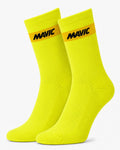 Pair of Mavic performance crew-height cycling socks in vibrant high-visibility safety yellow, featuring a single horizontal accent stripe at the cuff with black Mavic text branding, displayed against a plain background.