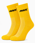 Pair of Mavic performance crew-height cycling socks in signature vibrant yellow, featuring bold black text branding on the ribbed cuff and a distinct white-flecked mesh ventilation panel on the instep, displayed against a plain background.