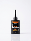 A 50ml black bottle of WATT Multi-Purpose Lube with an orange and black label, featuring a long precision applicator nozzle, standing upright against a clean white background.
