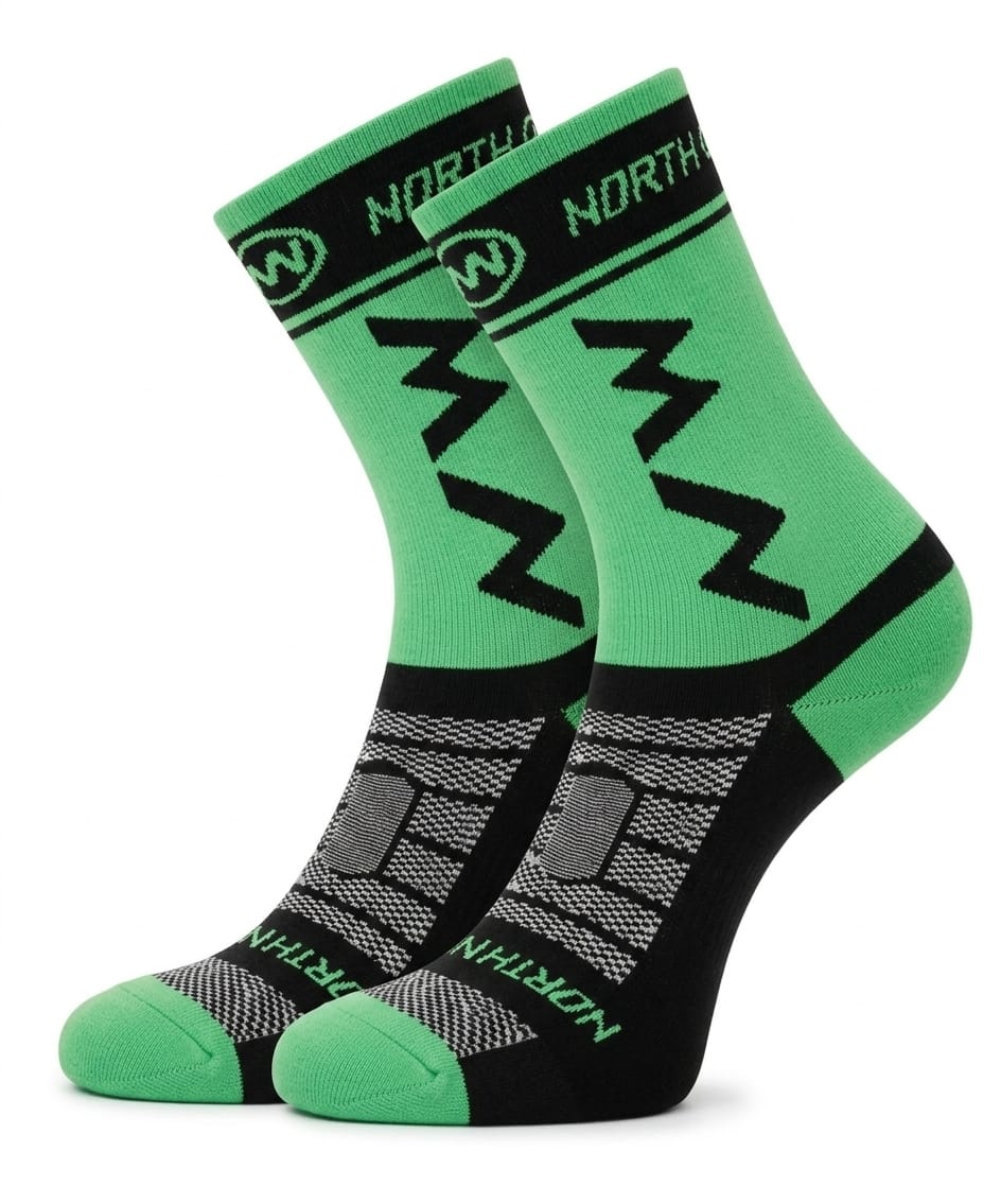 A pair of NORTHWAVE performance crew cycling socks in a vibrant green and black colorway, showcasing geometric NW branding on the upper cuff and a textured mesh design over the foot, displayed upright against a clean white background