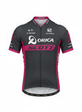 Front studio view of the charcoal gray Orica-Scott short-sleeve cycling jersey, highlighting the prominent white Orica and pink SCOTT logos across the chest with bright pink side panels.