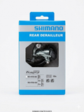 Vertical blue and silver retail box packaging for the Shimano Tiagra RD-4700-GS 10-speed medium cage rear derailleur, with the component visible through the display cutout.