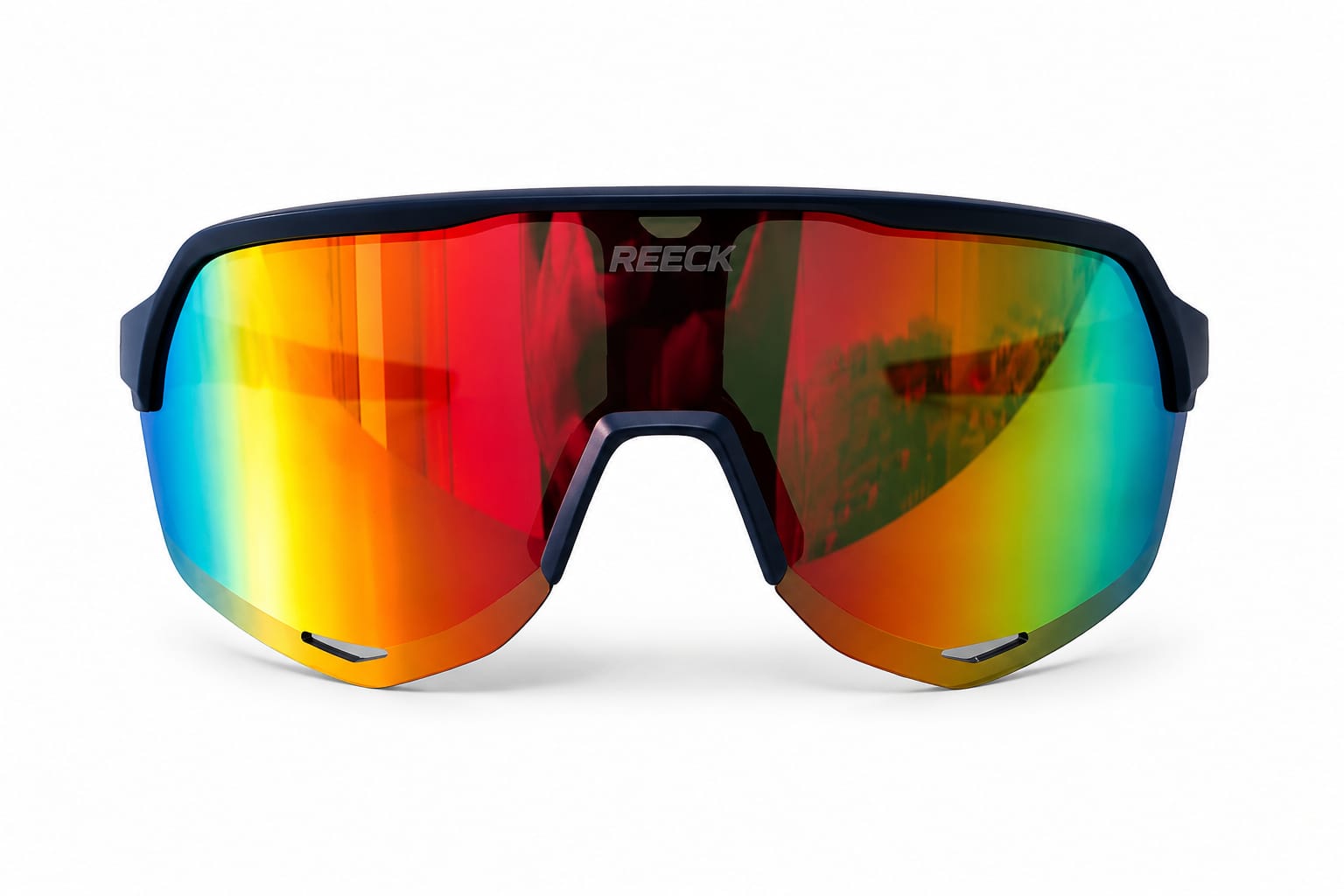 Front view of REECK AeroShield full-frame sports sunglasses featuring a matte navy blue frame and an oversized wrap shield lens with an iridescent crimson red, gold, and green mirror finish.