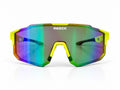 Front view of REECK Prism half-frame sports sunglasses featuring high-visibility neon yellow frame accents and an angular, rimless-bottom shield lens shifting from forest green to violet.