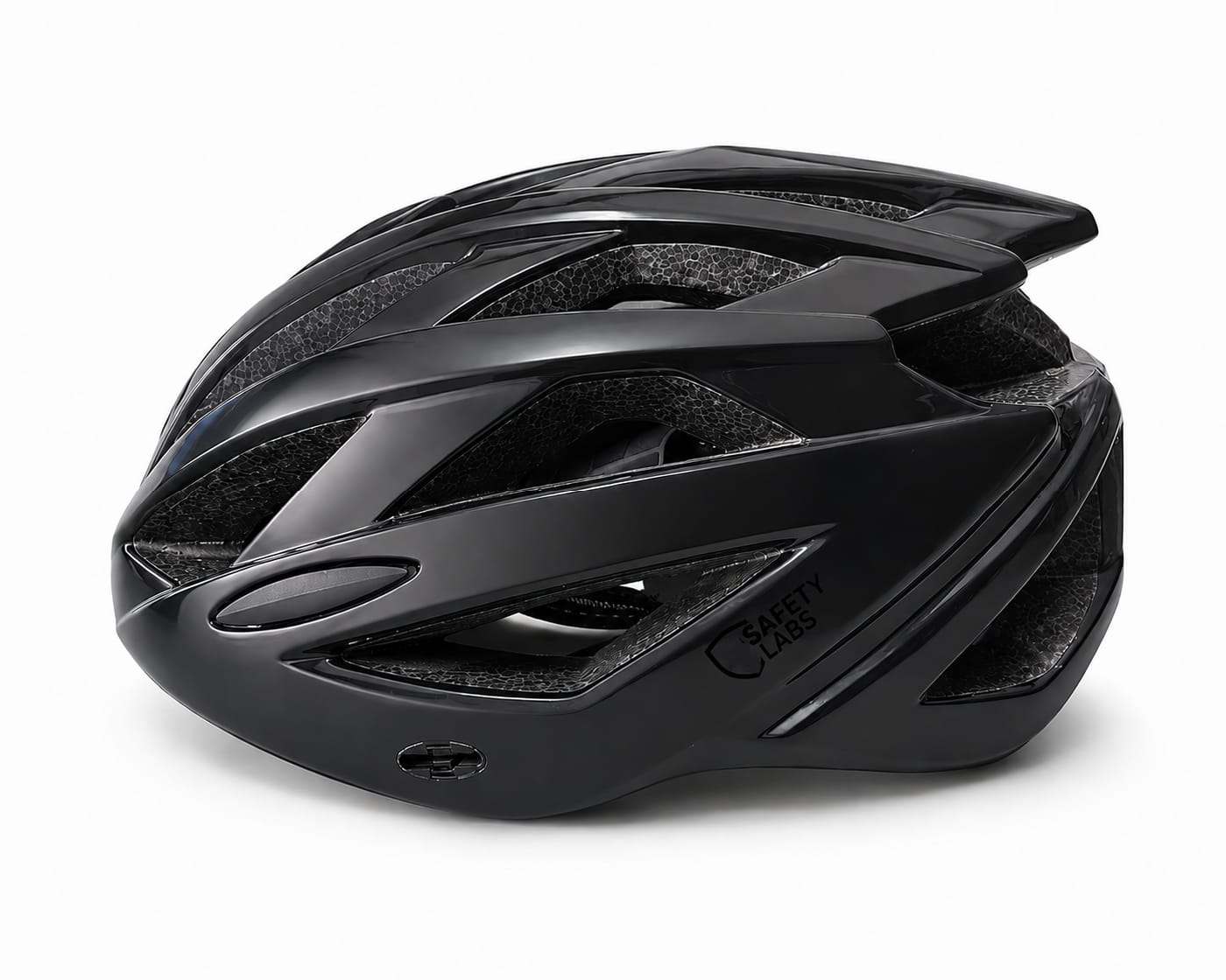 Side profile view of a solid gloss black Safety Labs cycling helmet featuring multiple deep aerodynamic cooling vents and a subtle black logo on a pure white background