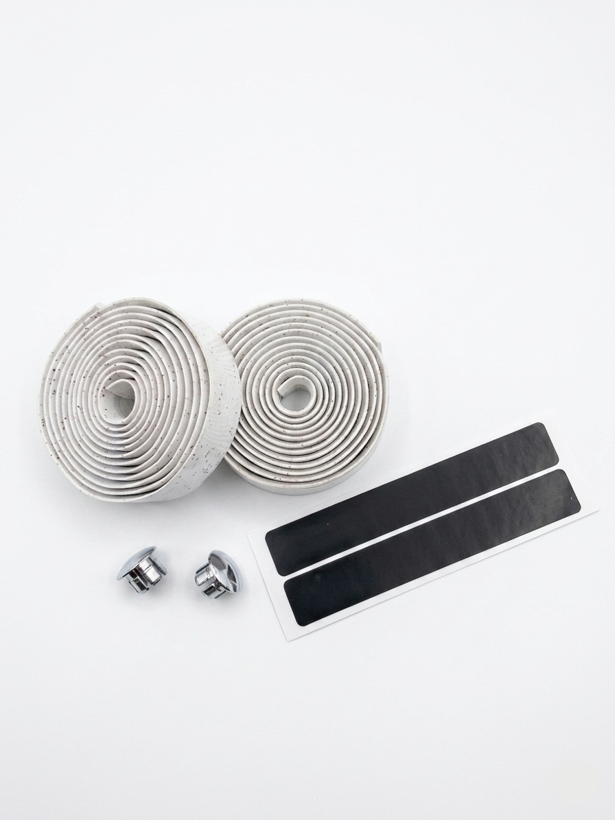 Premium off-white bicycle handlebar tape rolls with a natural cork-speckled pattern as seen in image accompanied by two reflective chrome bar end plugs and two black adhesive finishing strips on a clean white background.