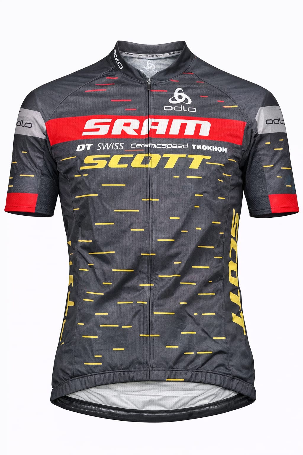 Front view of a pro team short sleeve cycling jersey in dark gray with a red chest band, yellow Scott logo, and horizontal yellow dashed line patterns.