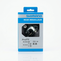 Shimano Tiagra RD-4700-GS 10-speed medium cage rear derailleur in its original blue and grey retail packaging.